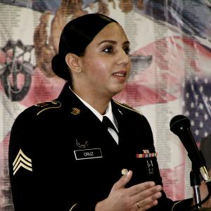 A Temple University student and active duty member of the military speaks during Veterans Day Ceremonies at Temple University Ambler.