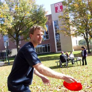 Throwing around a Frisbee at Temple University Ambler.