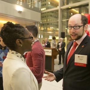student practicing networking with Temple alumnae