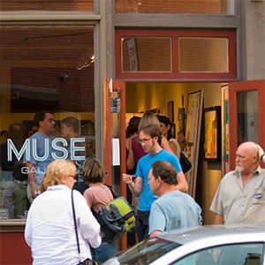 People visiting an art gallery