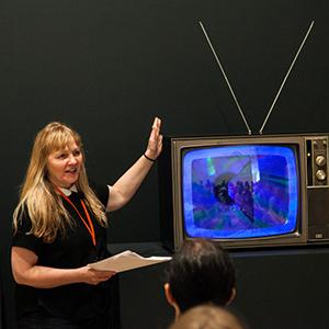Chrissie Iles with a TV