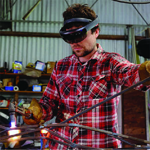 Man welding using AR Goggle