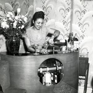 woman pouring wine