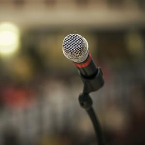 A picture of microphone on a stand.