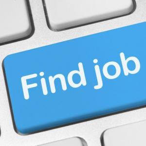 a button on the computer keyboard in blue that says "find job". 