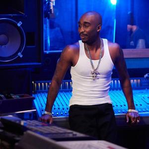 Still of Demetrius Shipp Jr. as Tupac Shakur in recording Studio.