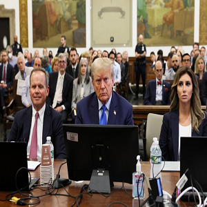 image of Trump and two lawyers sitting at a table in the supreme court for Trumps trial