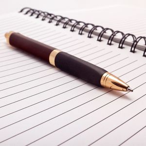 A pen on a notebook