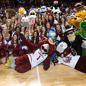 Mascots celebrating Hooters birthday at the Liacouras Center.