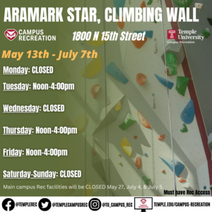 Facility schedule with climbing wall in background