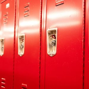 A close up shot of some of the red lockers in the locker rooms of Pearson and McGonigle Halls.