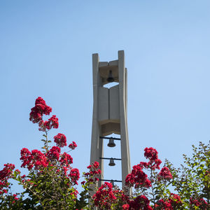 Temple bell tower and flowers