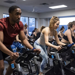 Students in an Indoor Cycling group fitness session at the IBC Student Rec Center. 