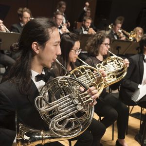 performers playing french horns