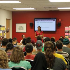 Peer advisor Tara Benner shares her experience abroad at an info session